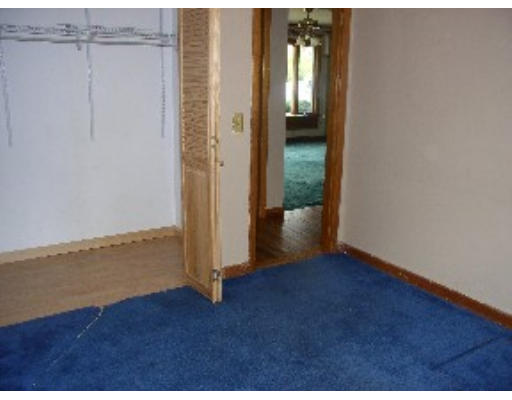 393 Hardwick Road Hardwick, MA 01031 - Photo 8 of 8 an empty room with wooden floor