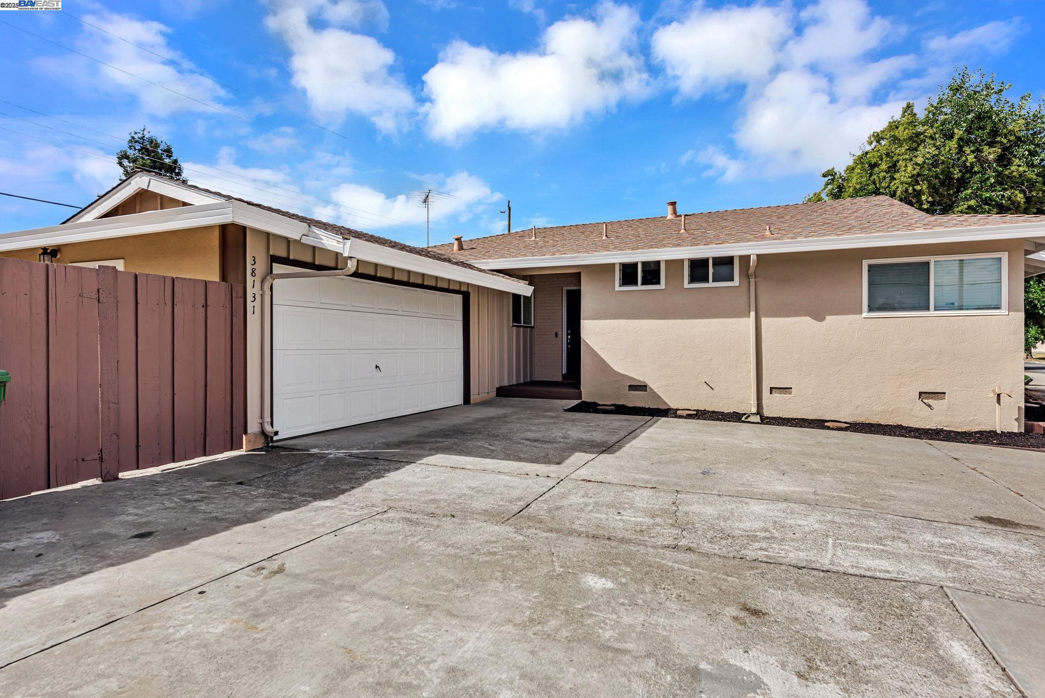 a view of a house with a garage
