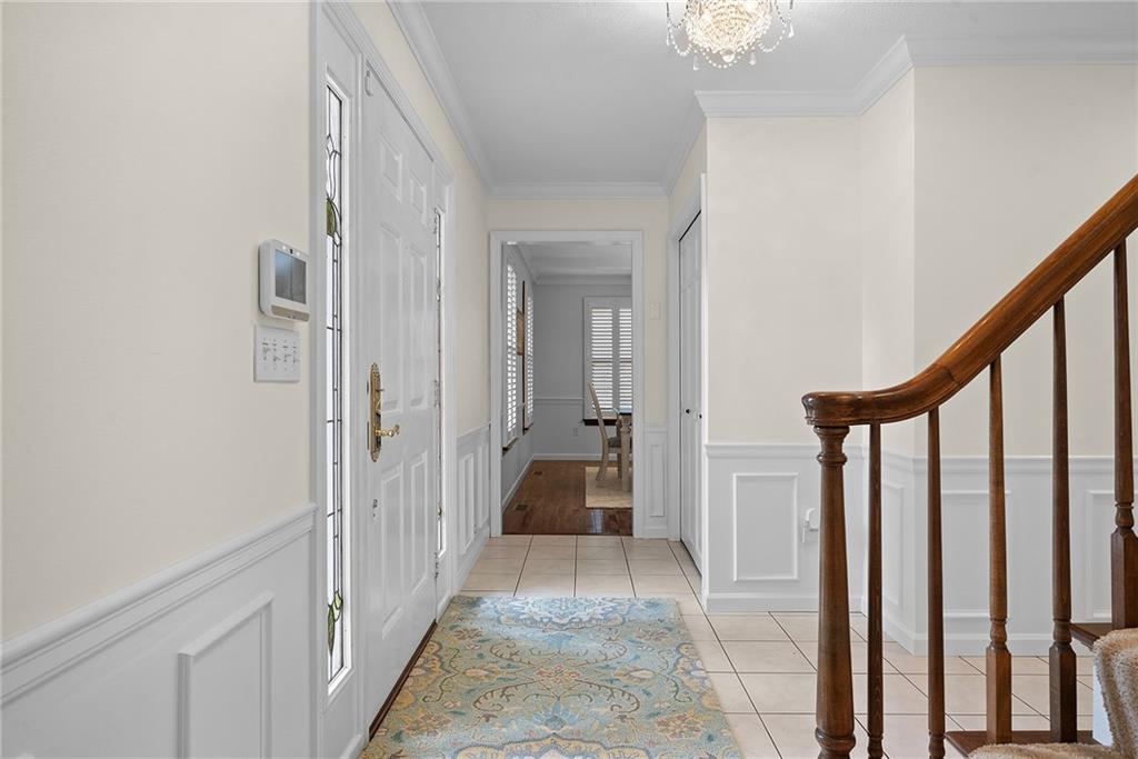 2779 Clearview Road Allison Park, PA 15101 - Photo 16 of 49 Classic wainscoting and crown molding add architectural detail throughout. View toward Dining room.