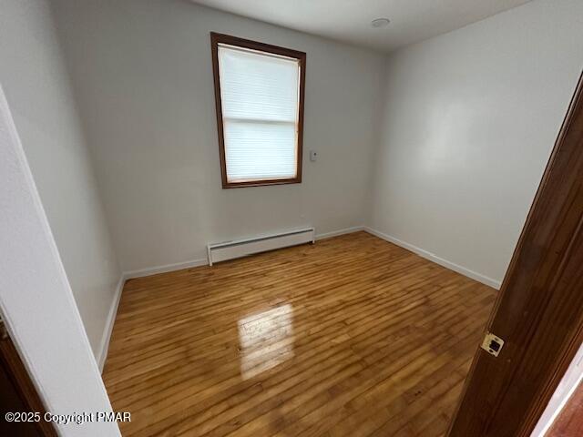 5130 Walnut Lane Kunkletown, PA 18058 - Photo 17 of 27 an empty room with wooden floor and windows