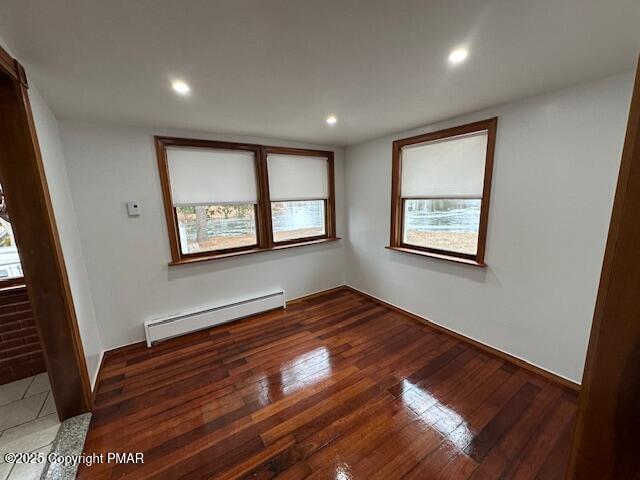 5130 Walnut Lane Kunkletown, PA 18058 - Photo 9 of 27 a view of an empty room with wooden floor and a window