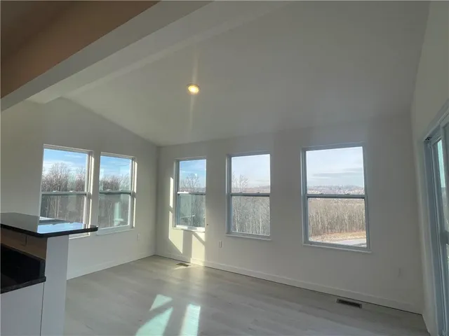 a bathroom with a sink double vanity and tub