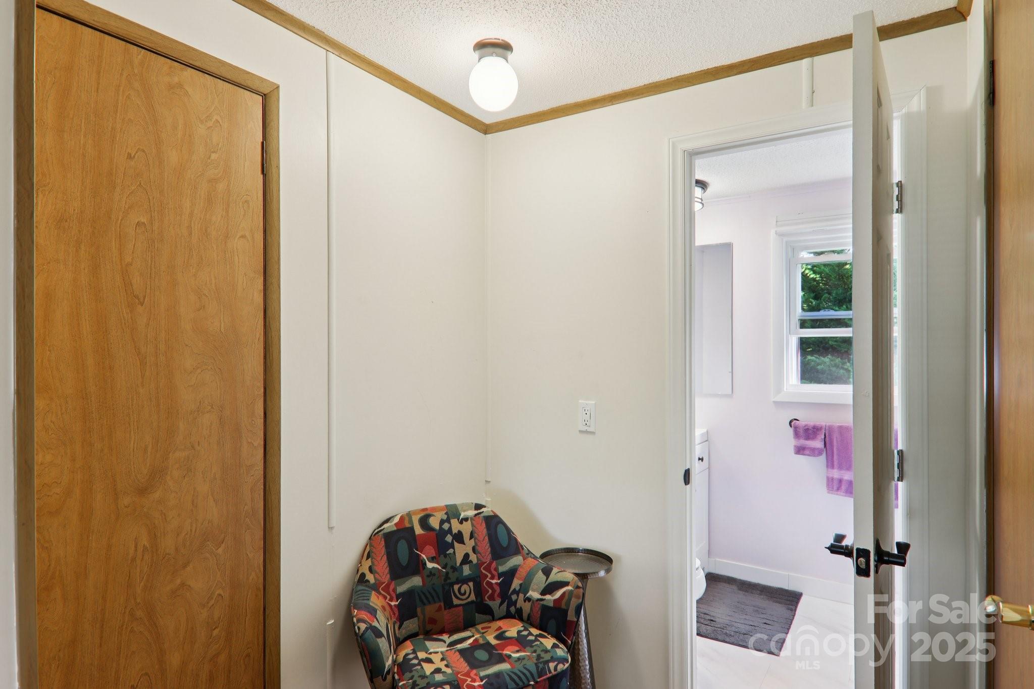226 Cranbrook Circle Hendersonville, NC 28792 - Photo 21 of 47 a bedroom with a bed and a window