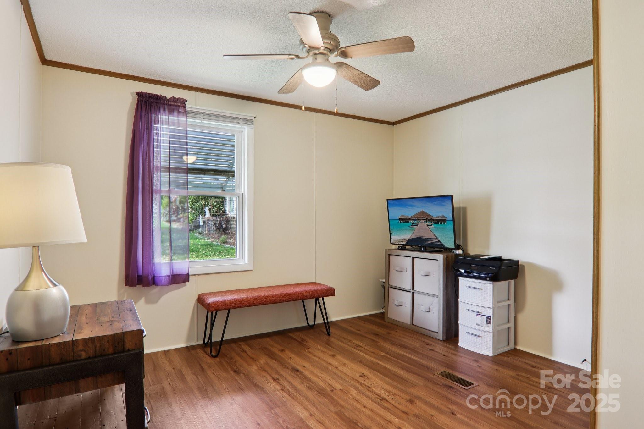 226 Cranbrook Circle Hendersonville, NC 28792 - Photo 24 of 47 a bedroom with furniture and a window