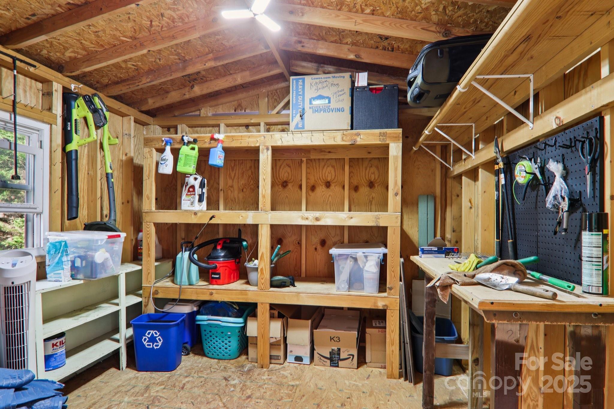 226 Cranbrook Circle Hendersonville, NC 28792 - Photo 40 of 47 a roof deck with table and chairs