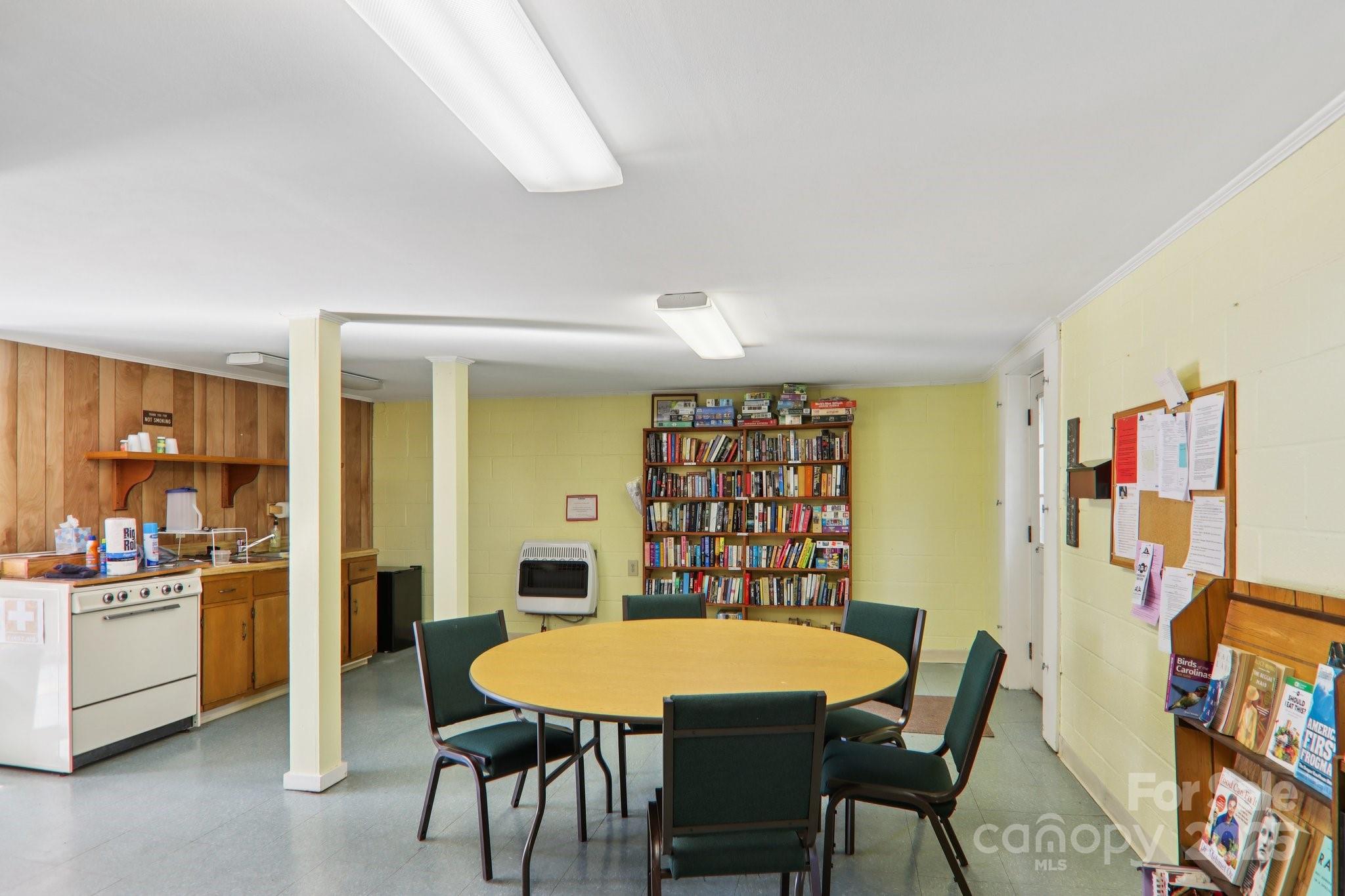 226 Cranbrook Circle Hendersonville, NC 28792 - Photo 47 of 47 a view of a a dining room with furniture window and wooden floor