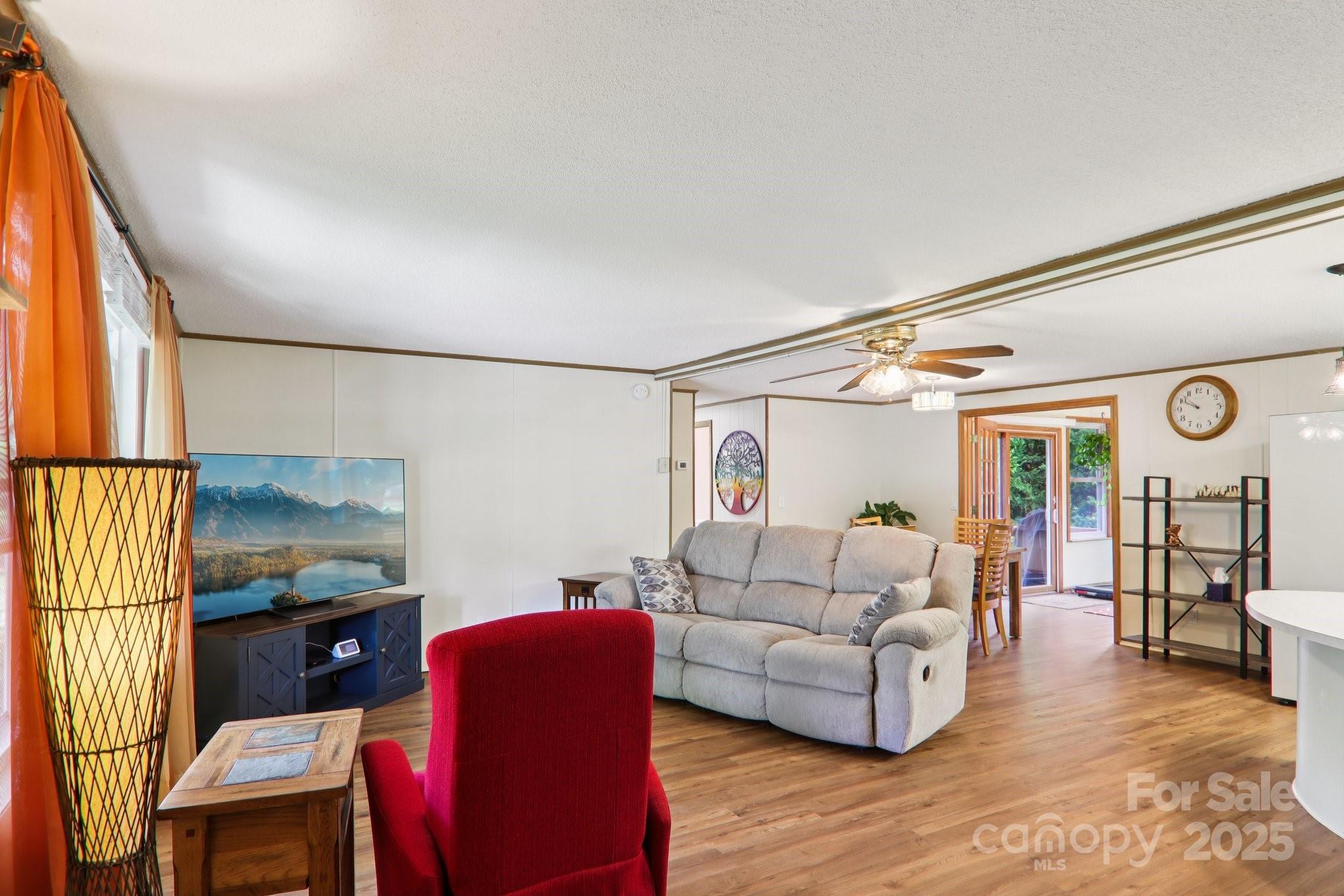 226 Cranbrook Circle Hendersonville, NC 28792 - Photo 7 of 47 a living room with furniture and a flat screen tv