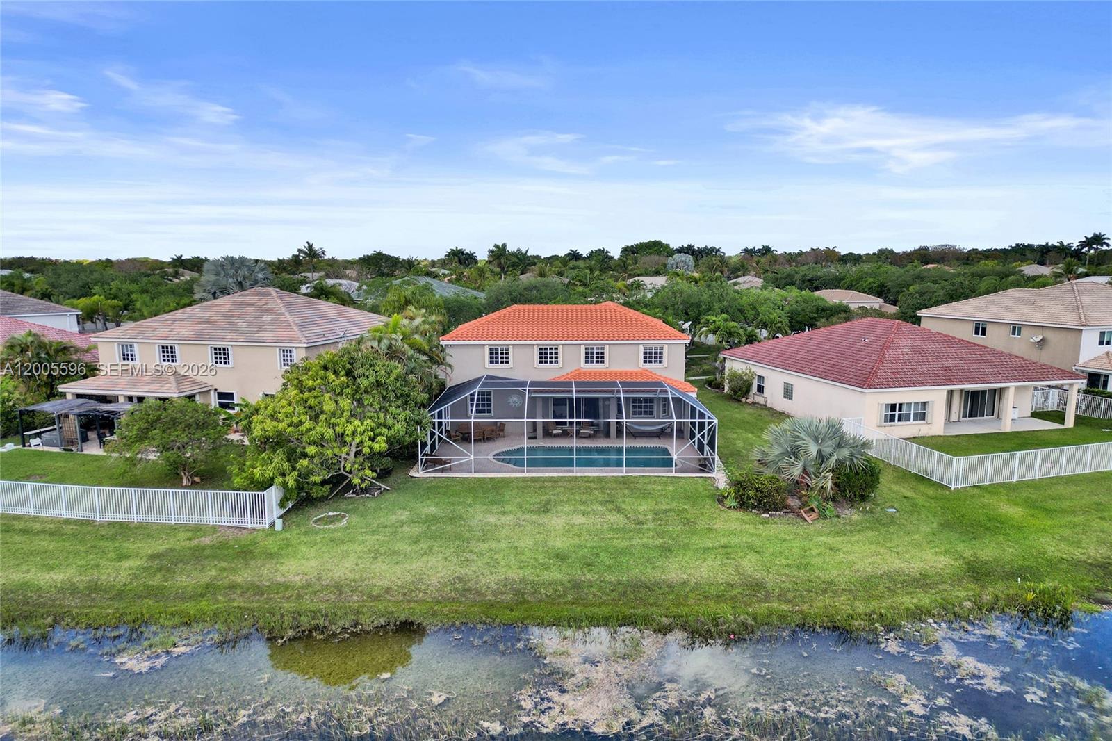 4281 Laurel Ridge Circle Weston, FL 33331 - Photo 9 of 80 an aerial view of a house is yard and green space
