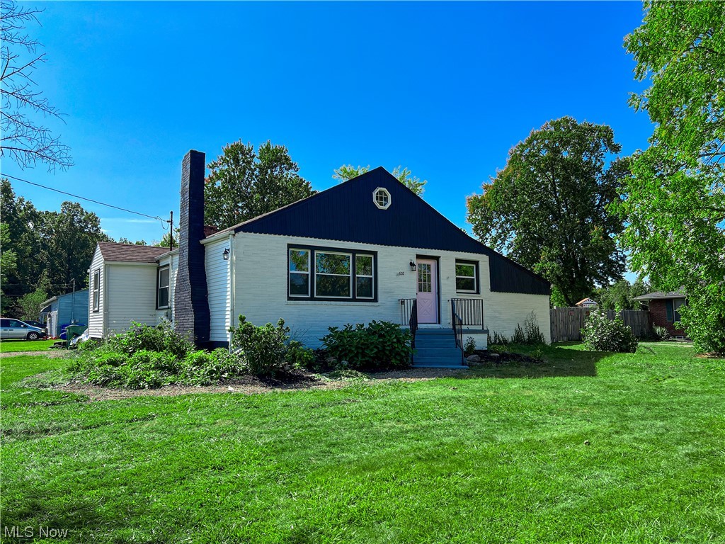 602 West Marshall Road McDonald, OH 44437 - Photo 1 of 19 Ranch-style house with a front lawn