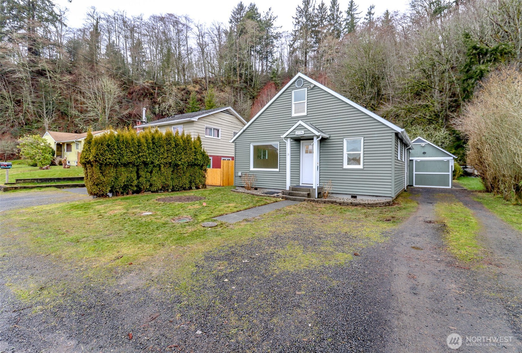 2115 Cherry Street Hoquiam, WA 98550 - Photo 2 of 31 a view of a house with a yard