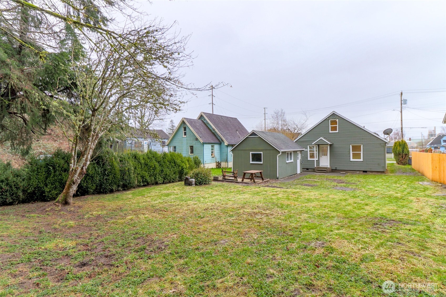 2115 Cherry Street Hoquiam, WA 98550 - Photo 30 of 31 a front view of a house with yard and green space