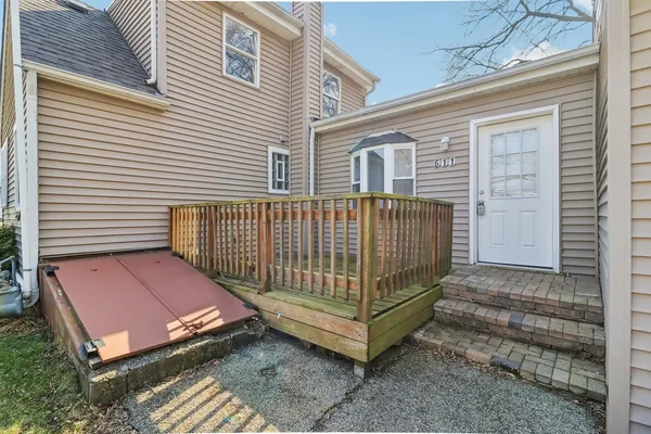 a view of a porch with a bench