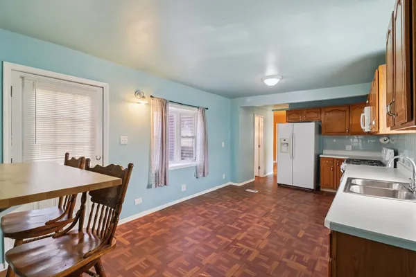 a bedroom with a bed and a table