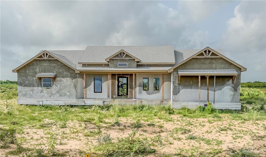 front view of house with a yard