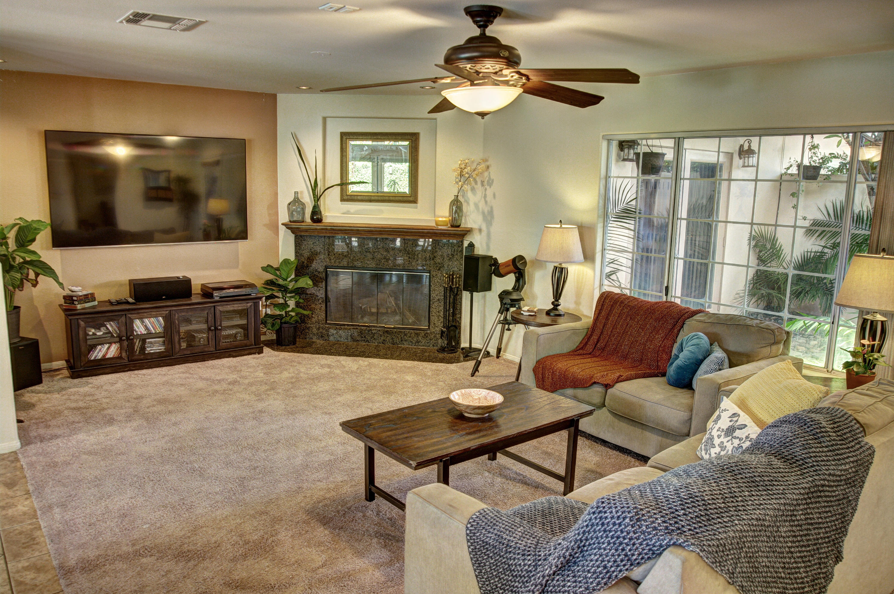 68446 Terrace Road Cathedral City, CA 92234 - Photo 14 of 81 a living room with furniture and a flat screen tv
