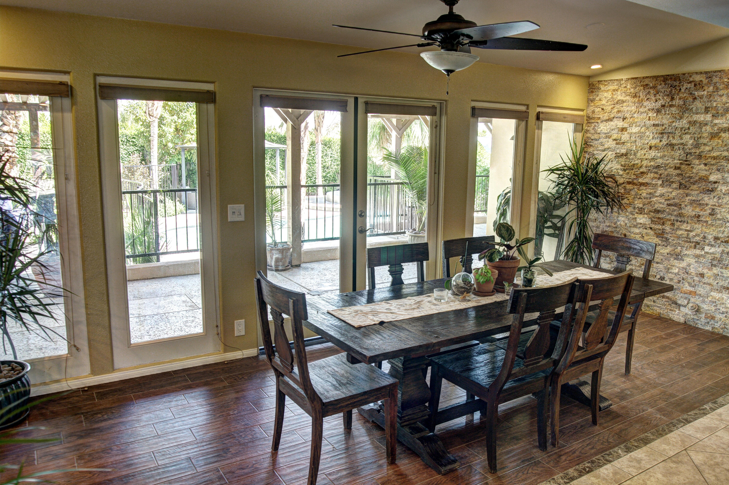 68446 Terrace Road Cathedral City, CA 92234 - Photo 16 of 81 a view of a dining room with furniture window and wooden floor