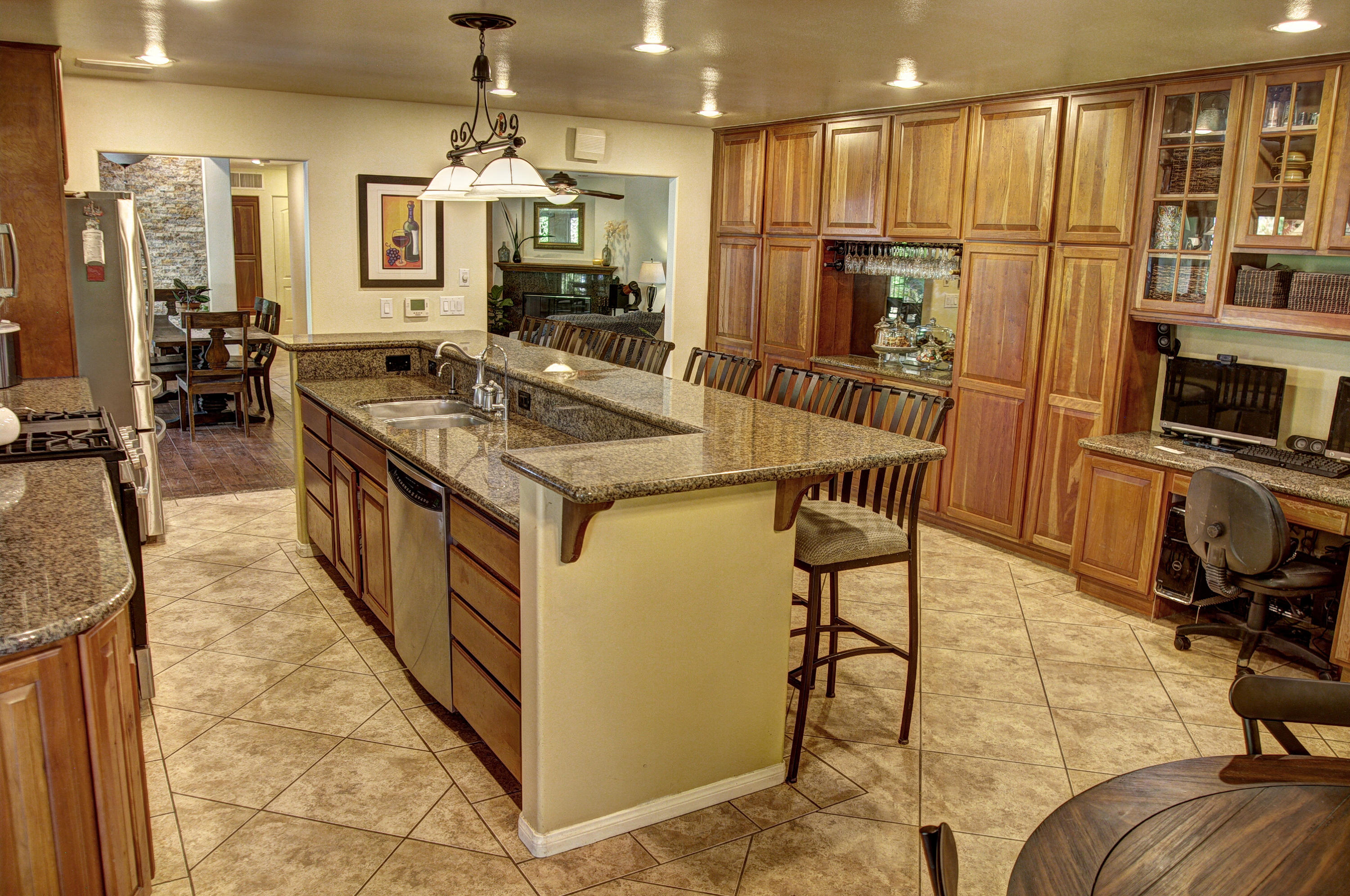 68446 Terrace Road Cathedral City, CA 92234 - Photo 26 of 81 a kitchen with stainless steel appliances granite countertop a stove and a refrigerator