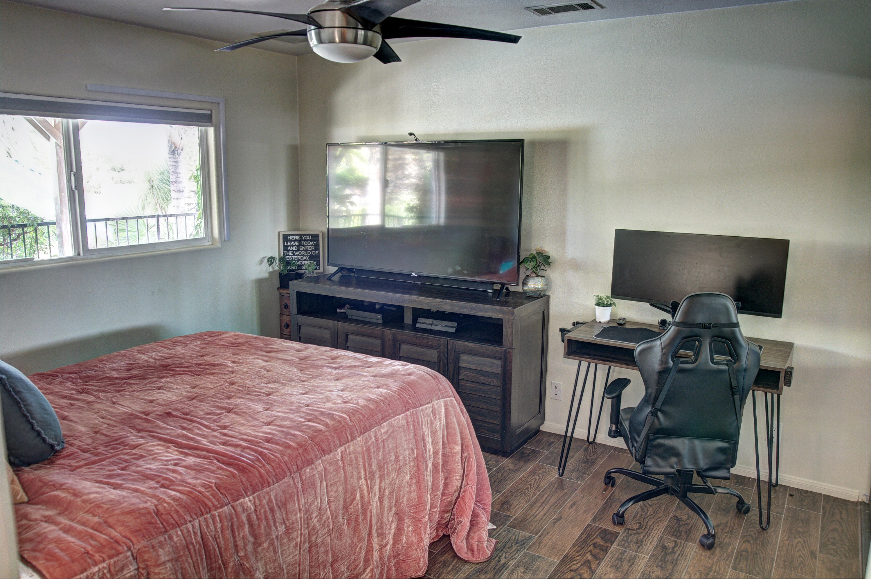 68446 Terrace Road Cathedral City, CA 92234 - Photo 34 of 81 a bedroom with a bed and a flat screen tv