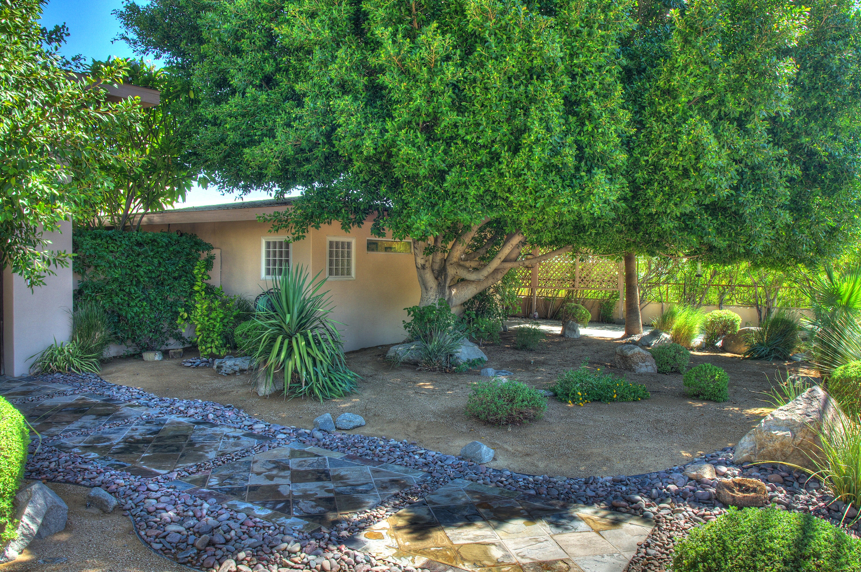 68446 Terrace Road Cathedral City, CA 92234 - Photo 51 of 81 a front view of a house with garden
