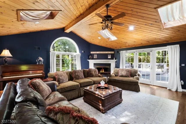 a bedroom with a bed and a fireplace