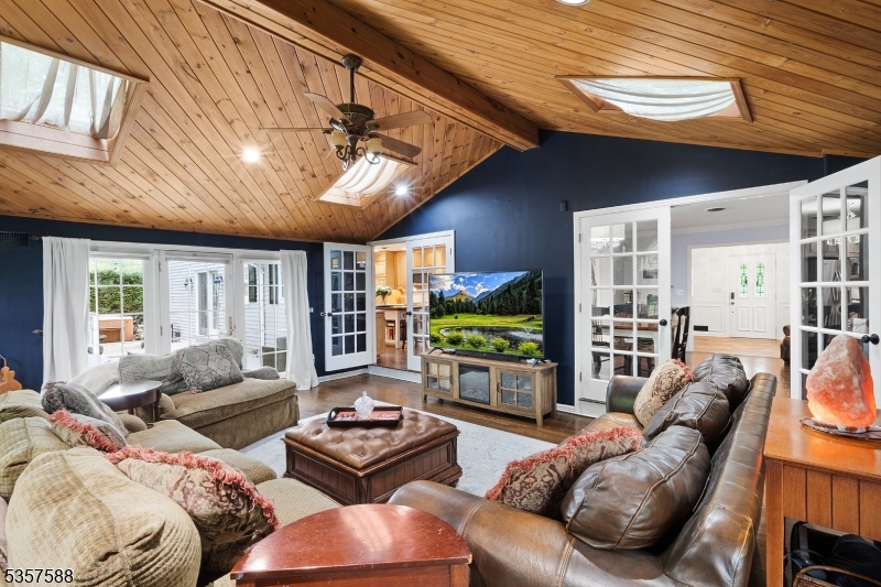 209 Lake Road Bernards, NJ 07920 - Photo 14 of 40 a living room with furniture and a large window