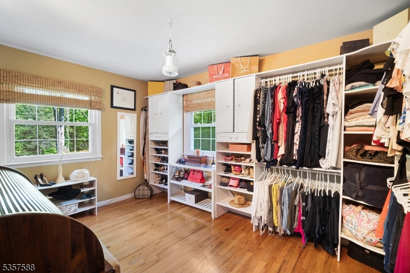 209 Lake Road Bernards, NJ 07920 - Photo 17 of 40 a bedroom with furniture and a large window