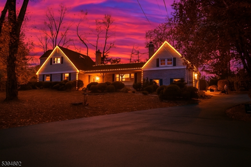 209 Lake Road Bernards, NJ 07920 - Photo 3 of 40 a front view of a house with a yard