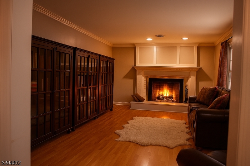 209 Lake Road Bernards, NJ 07920 - Photo 32 of 40 a living room with furniture and a fireplace