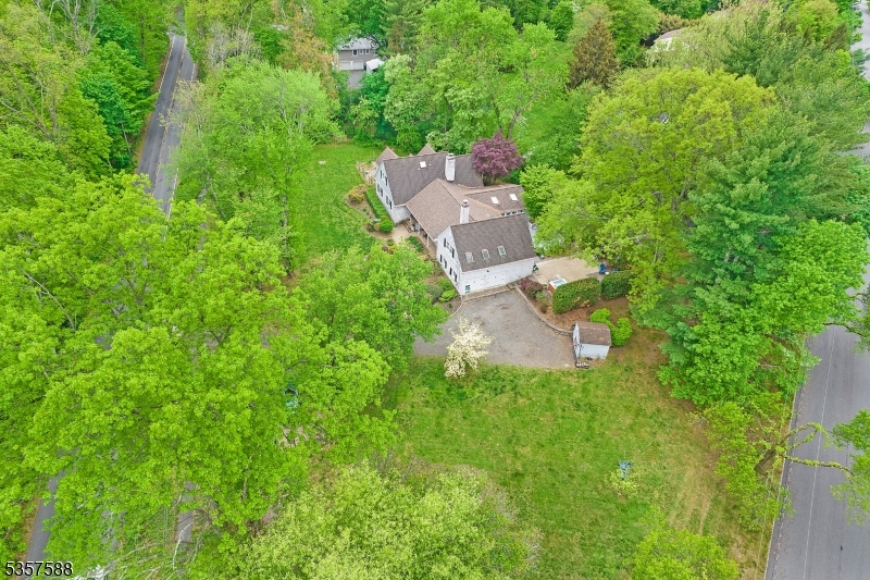 209 Lake Road Bernards, NJ 07920 - Photo 35 of 40 an aerial view of residential house with outdoor space and trees all around