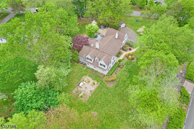 209 Lake Road Bernards, NJ 07920 - Photo 36 of 40 an aerial view of a house with garden space and street view