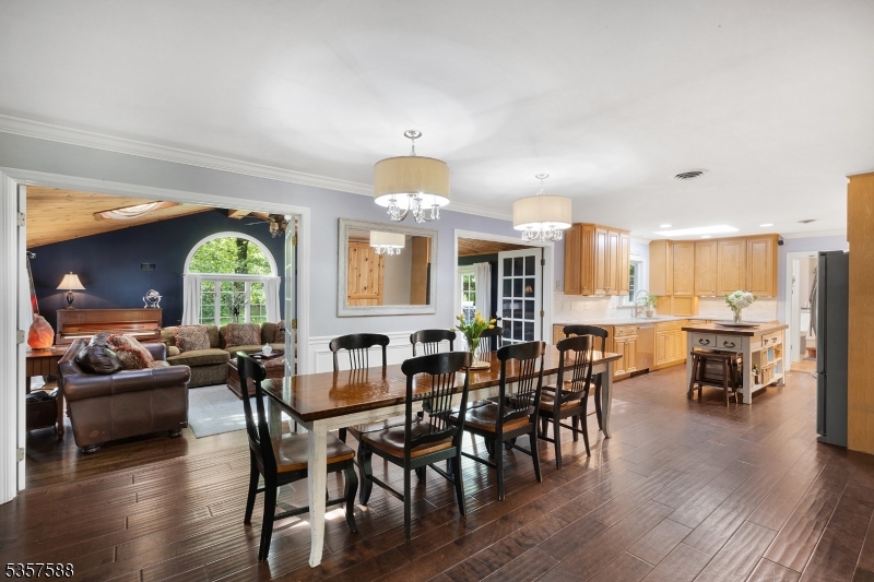 209 Lake Road Bernards, NJ 07920 - Photo 9 of 40 a view of a a dining room with furniture window and wooden floor