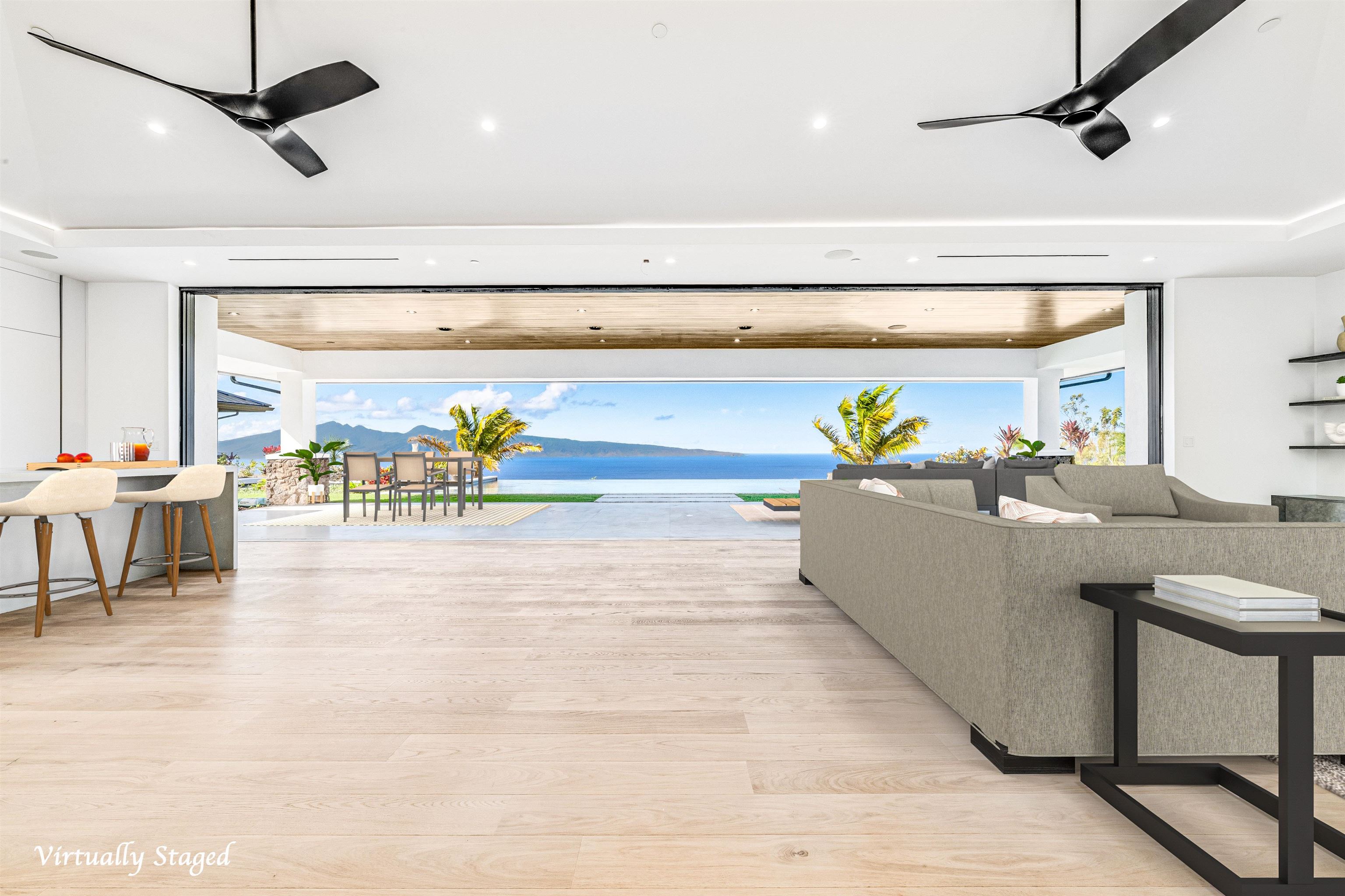 710 Mahana Rdg Street, Unit LOT 46 Lahaina, HI 96761 - Photo 3 of 50 a living room with furniture and outdoor view