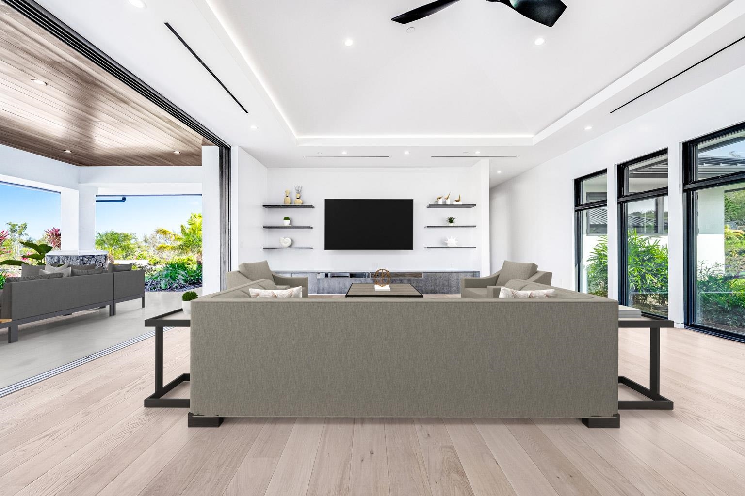 710 Mahana Rdg Street, Unit LOT 46 Lahaina, HI 96761 - Photo 5 of 50 a living room with furniture and a flat screen tv