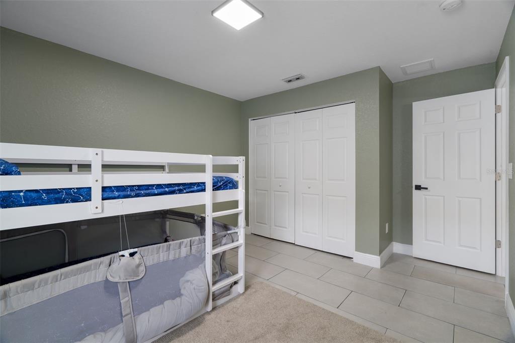 5106 Pacific Avenue Spring Hill, FL 34606 - Photo 17 of 23 a view of an empty room with shelf