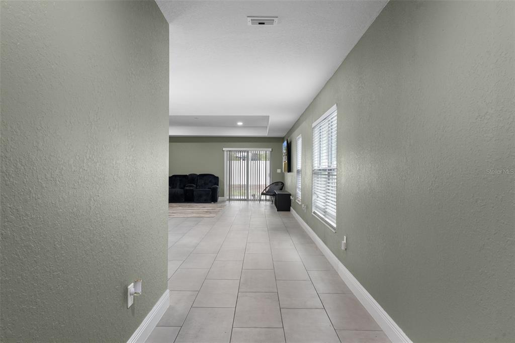 5106 Pacific Avenue Spring Hill, FL 34606 - Photo 5 of 23 a view of a living room with a window
