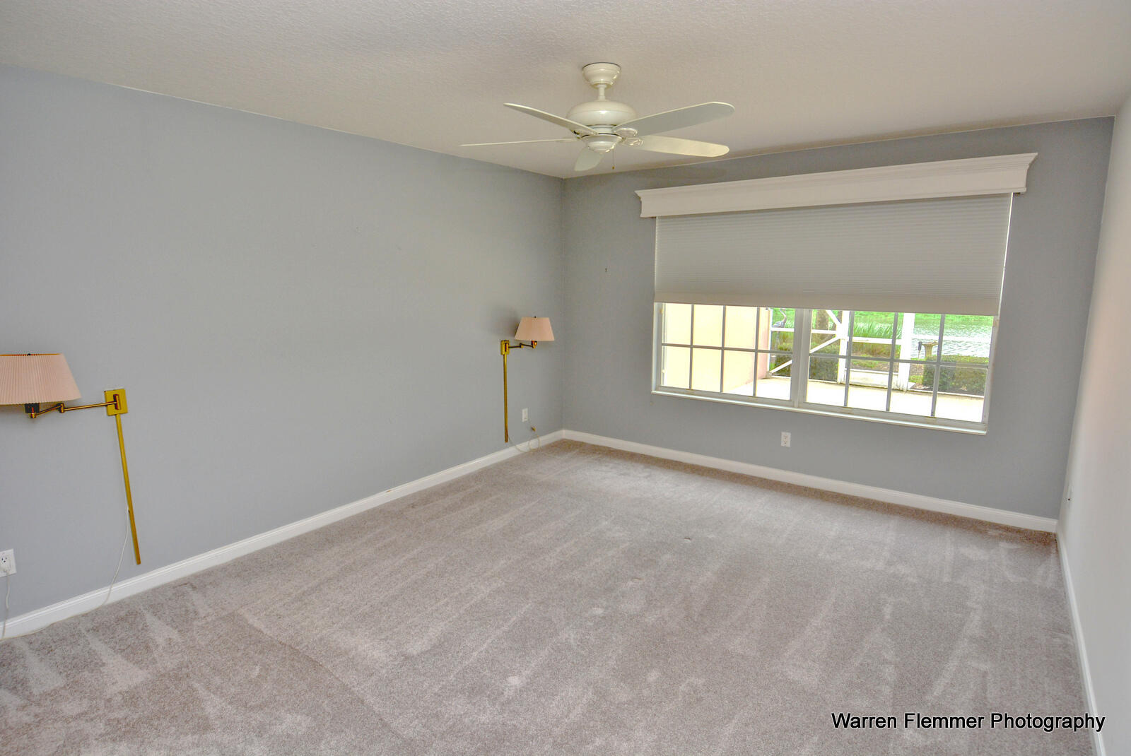 1044 Southwest Balmoral Trace Stuart, FL 34997 - Photo 13 of 34 a view of an empty room with a window