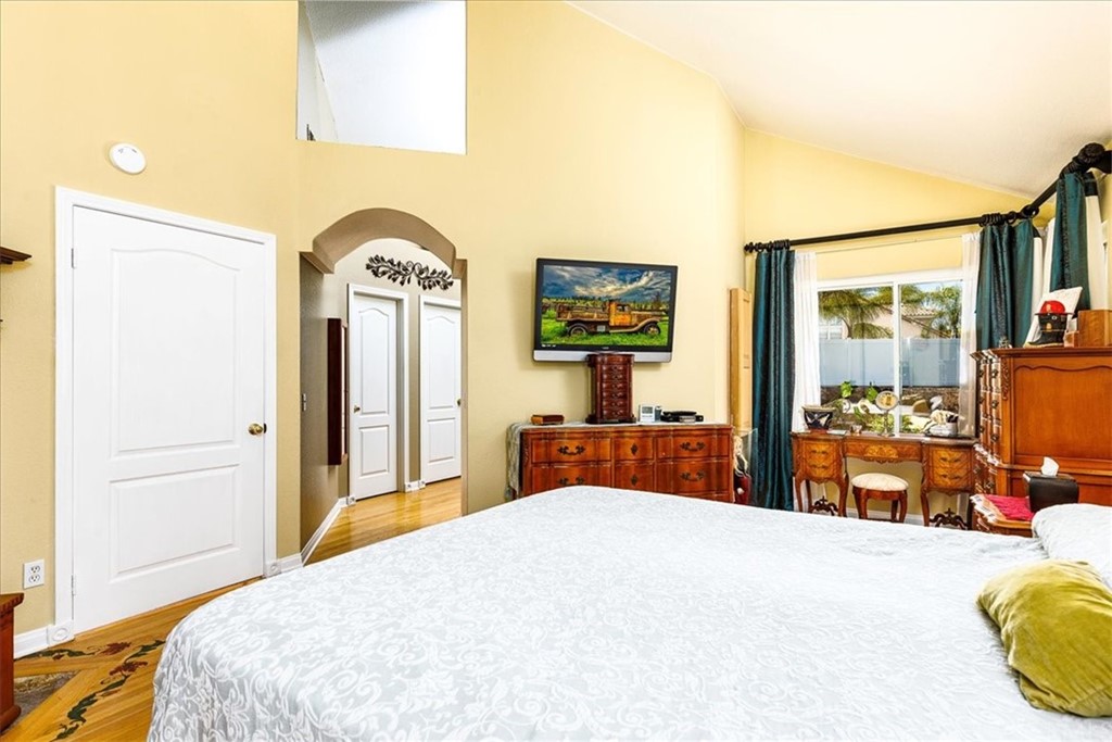 30152 Corte Carrizo Temecula, CA 92591 - Photo 17 of 45 a bedroom with a bed and dresser with mirror