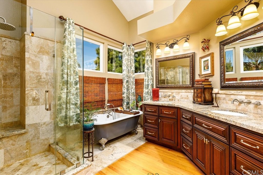 30152 Corte Carrizo Temecula, CA 92591 - Photo 18 of 45 a spacious bathroom with a tub sink and mirror