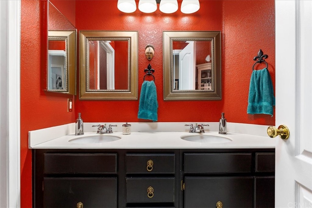 30152 Corte Carrizo Temecula, CA 92591 - Photo 20 of 45 a bathroom with a sink and a mirror