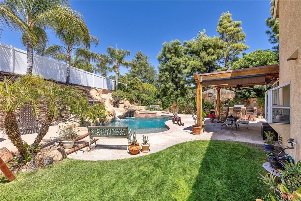 30152 Corte Carrizo Temecula, CA 92591 - Photo 28 of 45 a view of a house with backyard porch and sitting area