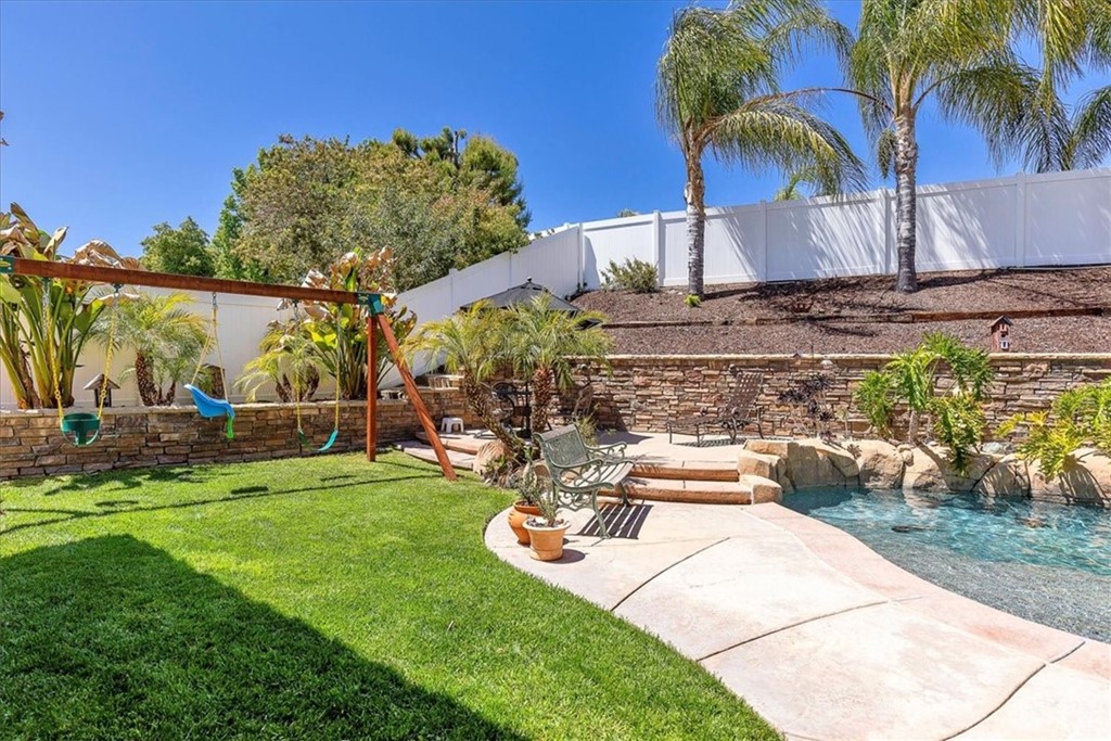 30152 Corte Carrizo Temecula, CA 92591 - Photo 29 of 45 a view of a backyard with plants and patio