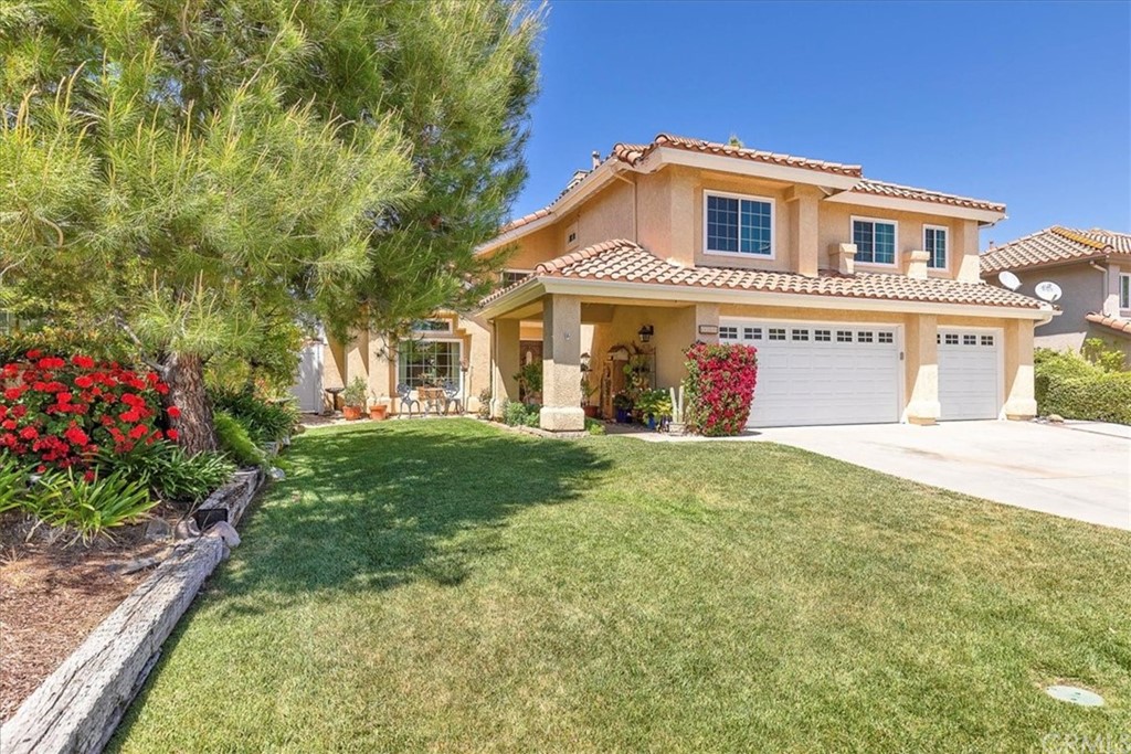 30152 Corte Carrizo Temecula, CA 92591 - Photo 3 of 45 a front view of a house with garden