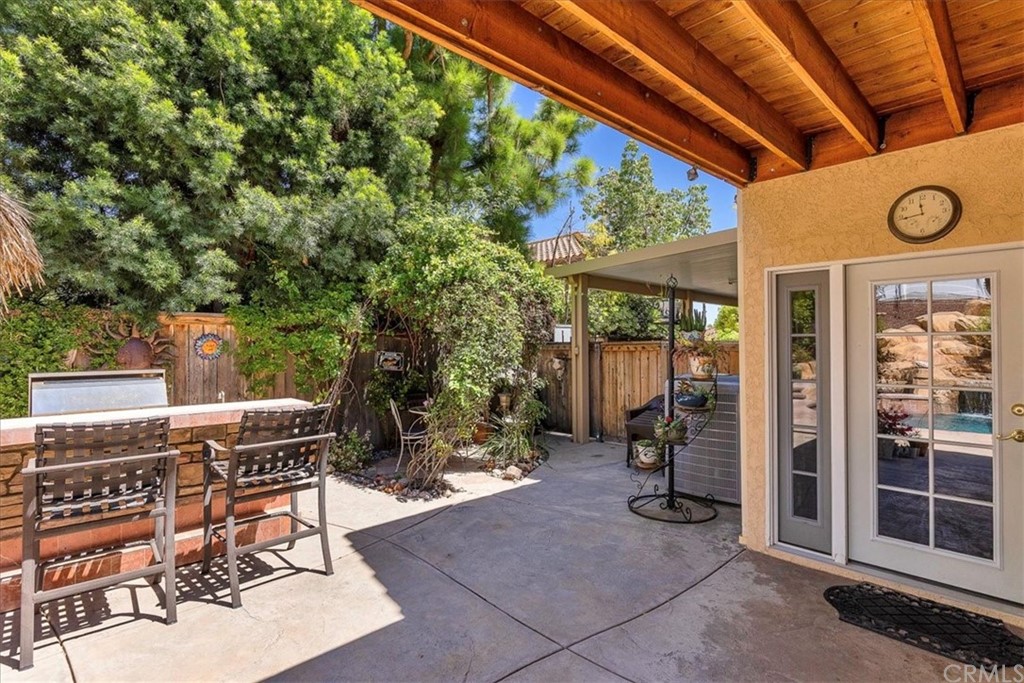 30152 Corte Carrizo Temecula, CA 92591 - Photo 33 of 45 a view of a patio with a table and chairs