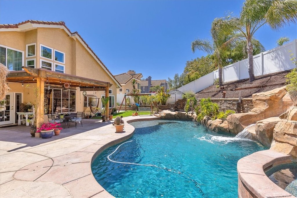 30152 Corte Carrizo Temecula, CA 92591 - Photo 36 of 45 a view of a house with backyard porch and patio