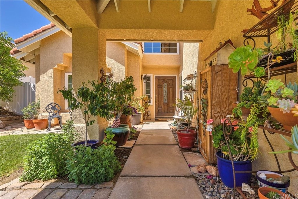 30152 Corte Carrizo Temecula, CA 92591 - Photo 5 of 45 a front view of a house with a yard