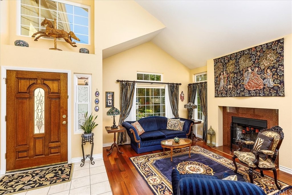 30152 Corte Carrizo Temecula, CA 92591 - Photo 6 of 45 a living room with furniture and a fireplace