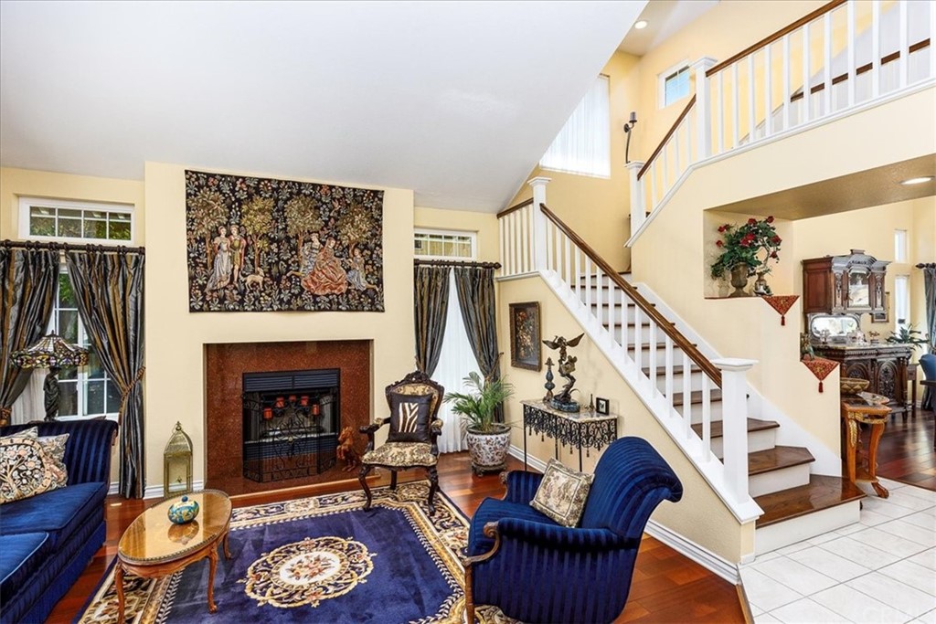 30152 Corte Carrizo Temecula, CA 92591 - Photo 7 of 45 a living room with furniture and a fireplace