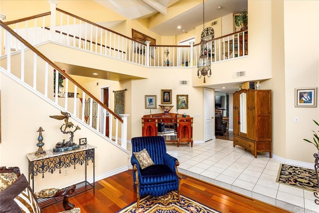30152 Corte Carrizo Temecula, CA 92591 - Photo 8 of 45 a view of entryway livingroom and hall with wooden floor