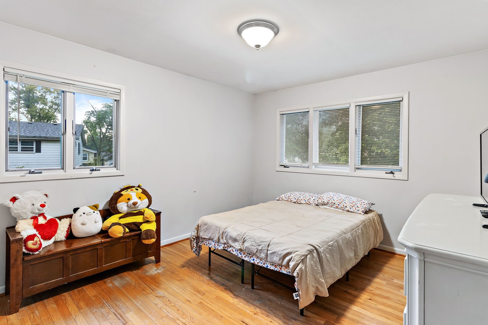 18807 Delta Road Homewood, IL 60430 - Photo 11 of 16 a bedroom with a bed and window