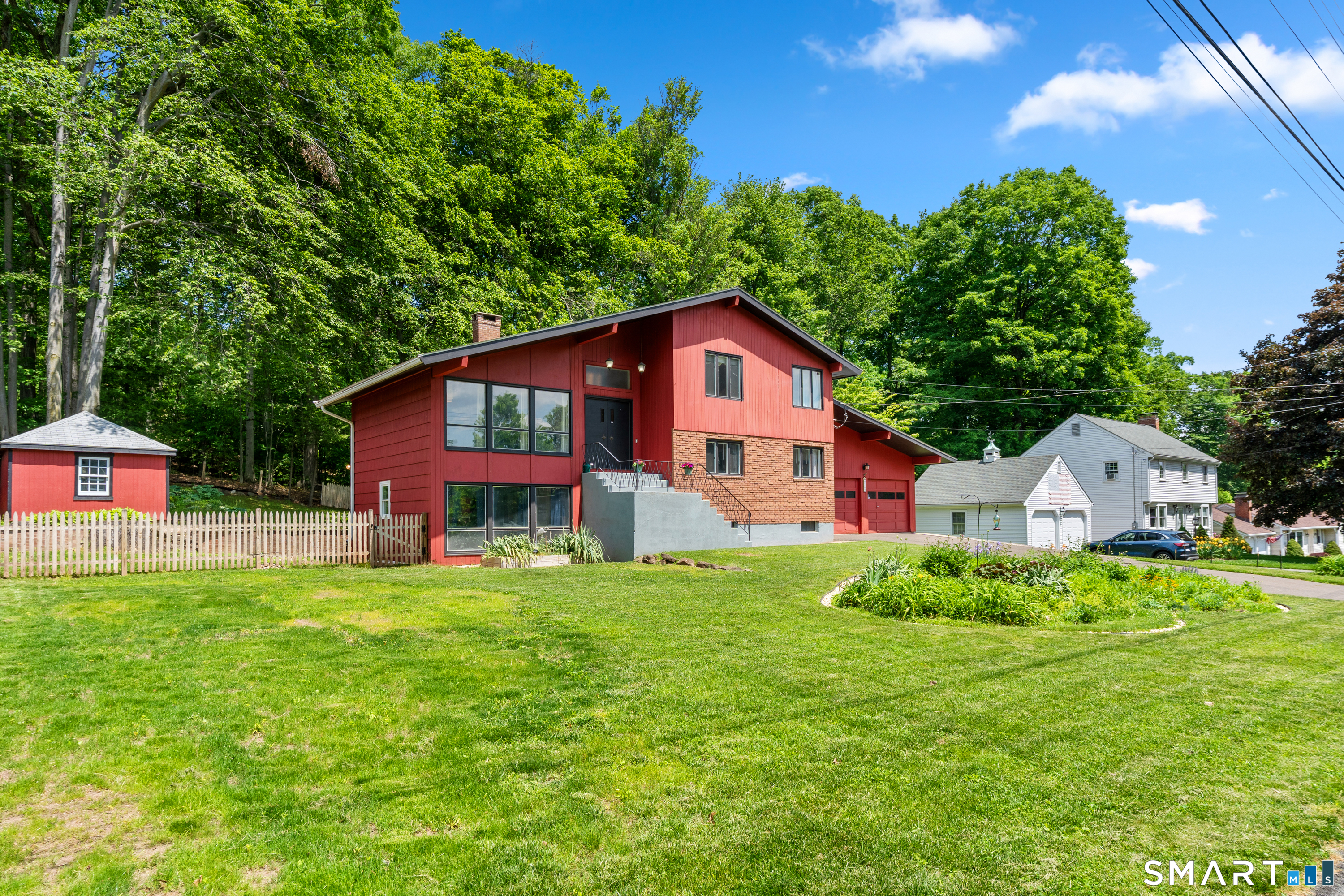 107 Round Hill Road Wethersfield, CT 06109 - Photo 4 of 40 a view of a house with a yard